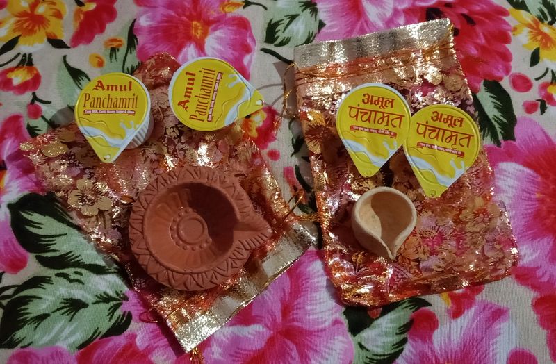 2 Pieces Diya + 4 Packs Amul Panchamrit