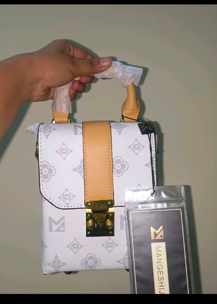 White Sling Bag With Tag Attached