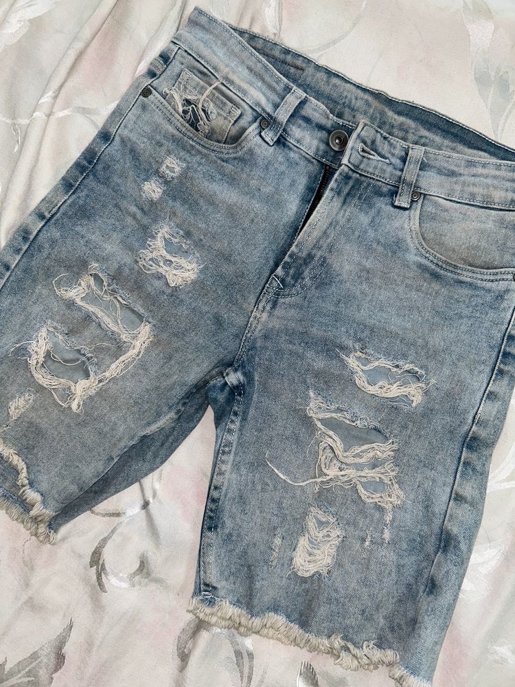 Distressed Blue Jeans