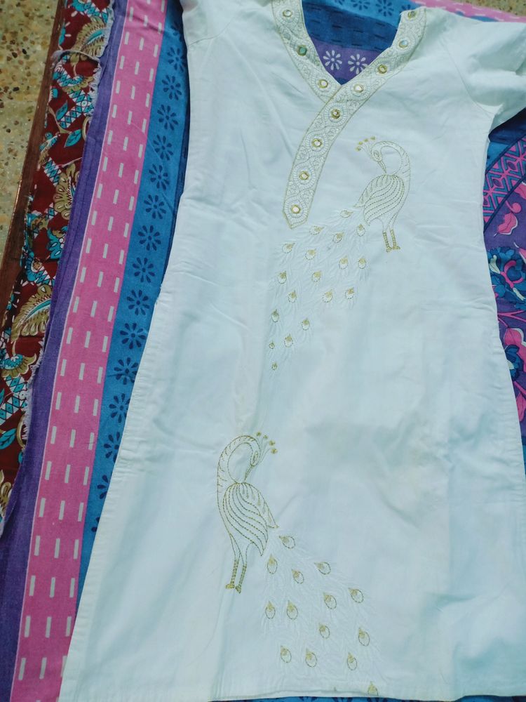 cotton white kurthi with peacock embroidery design