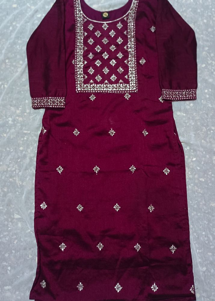 A Traditional Meroon Color Kurta (Womens Wear)