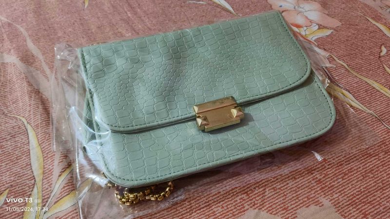 Mint green sling bag