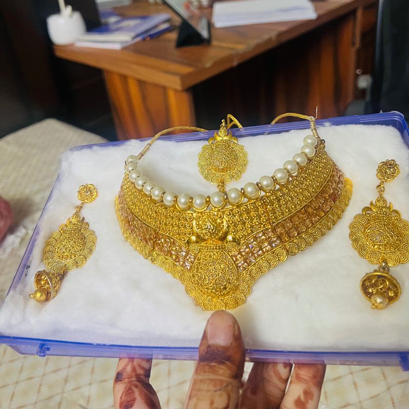 Golden Rajasthani Haar With Long Earrings And Tika