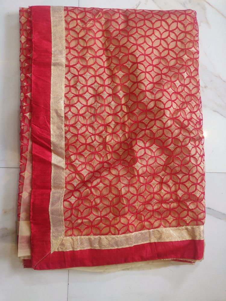 So Beautiful Red And Cream Colour Net Saree