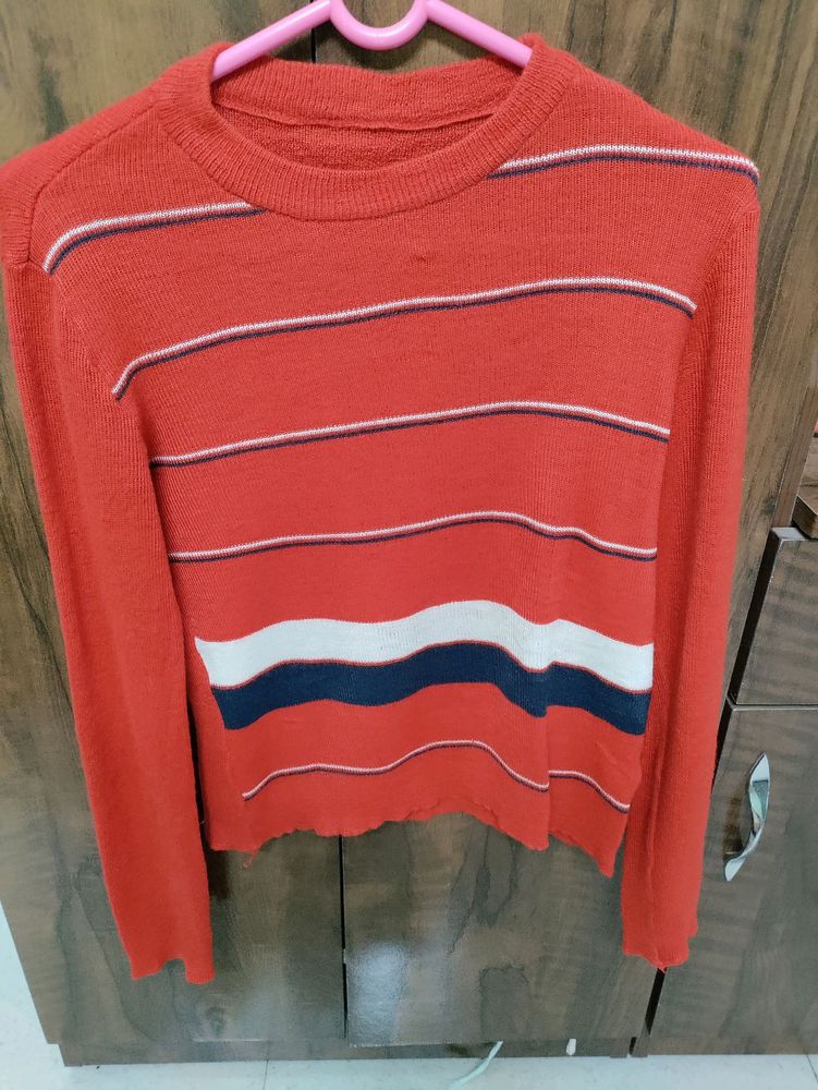 Red top with long sleeves