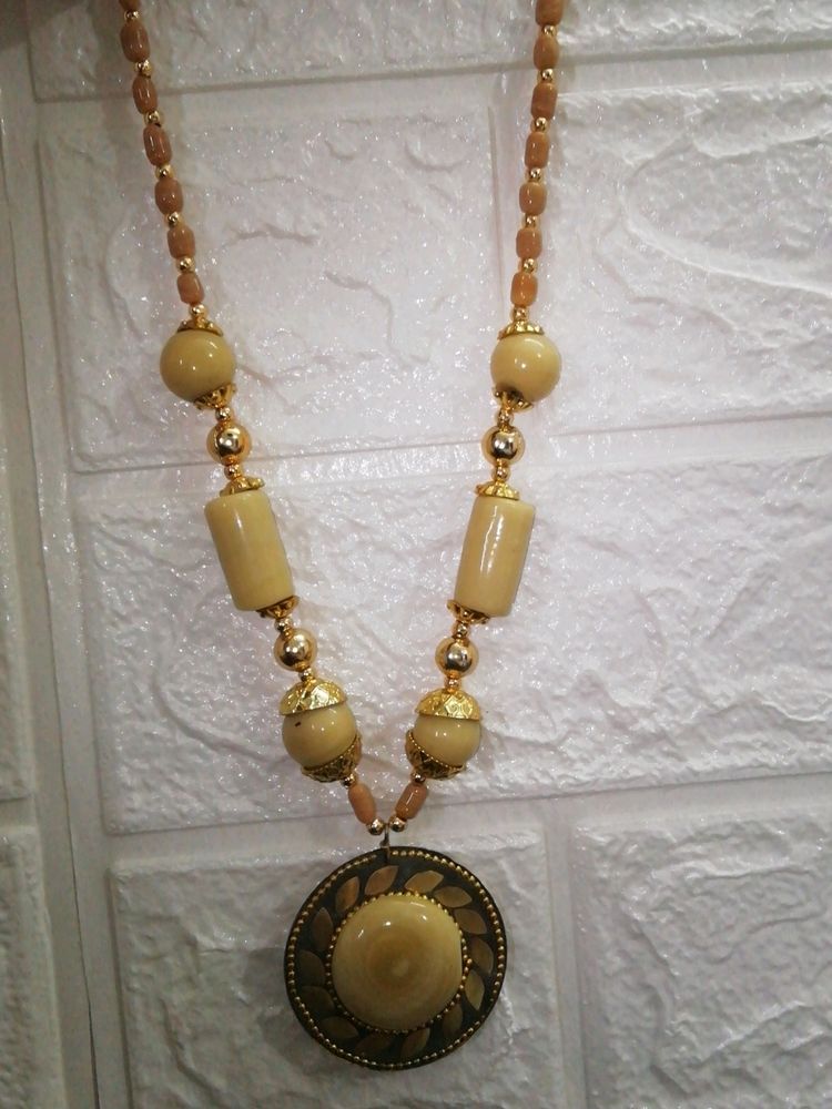 Beige coloured beads necklace neckpiece