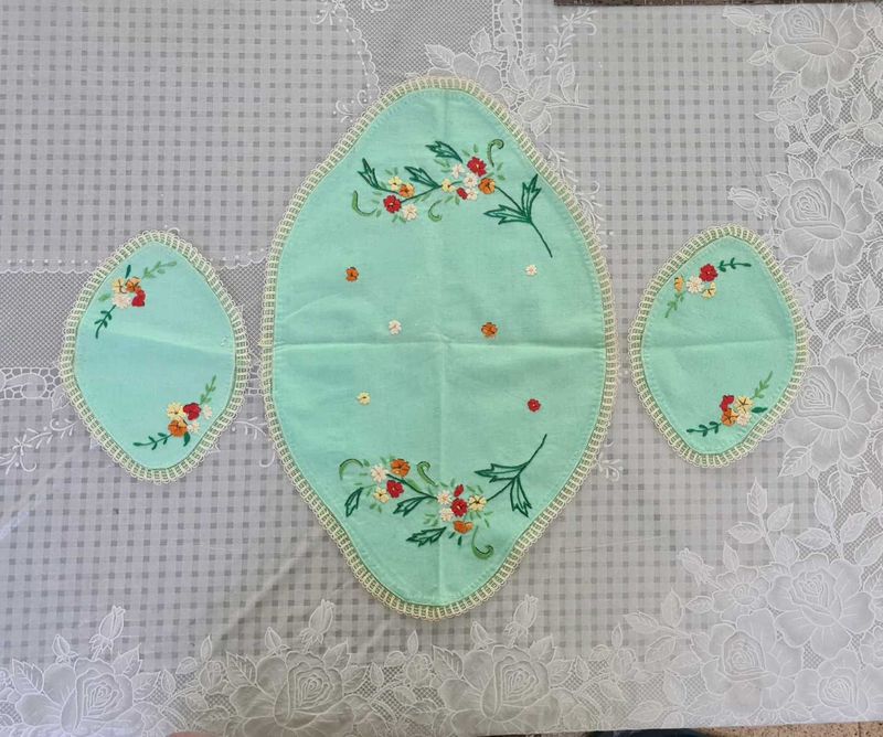 A Set of 3 hand embroidered table mats