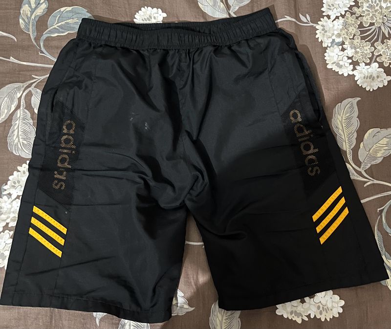 Black Short With Orange Strips