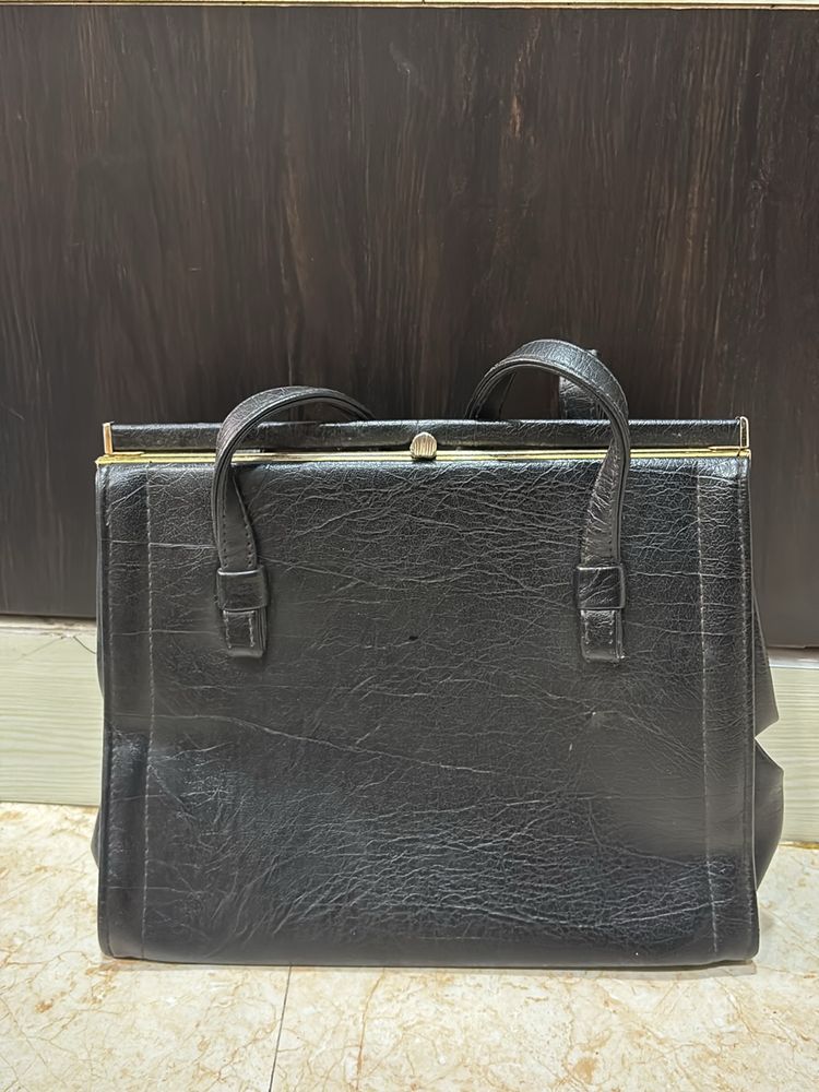 Thrifted Leather Hand Purse