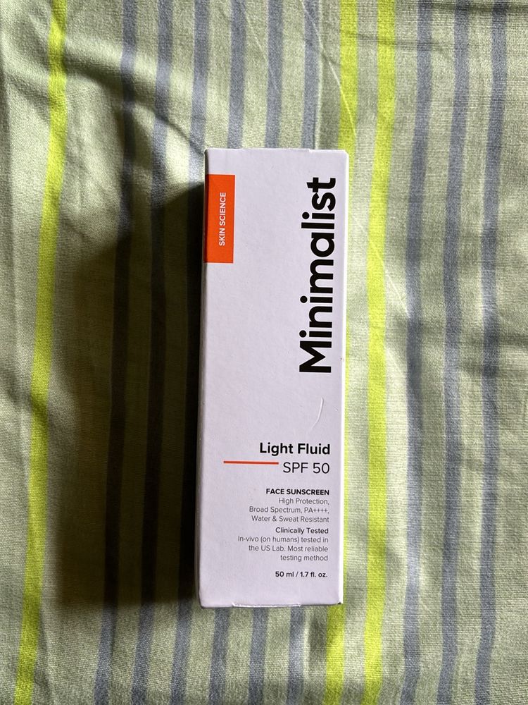 MINIMALIST LIGHT FLUID SPF 50 FACE SUNSCREEN