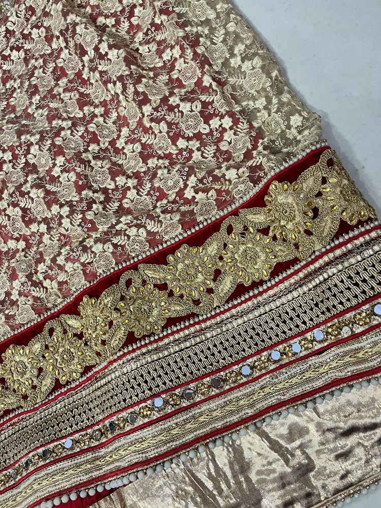 beautiful heavy saree in two colours red & cream