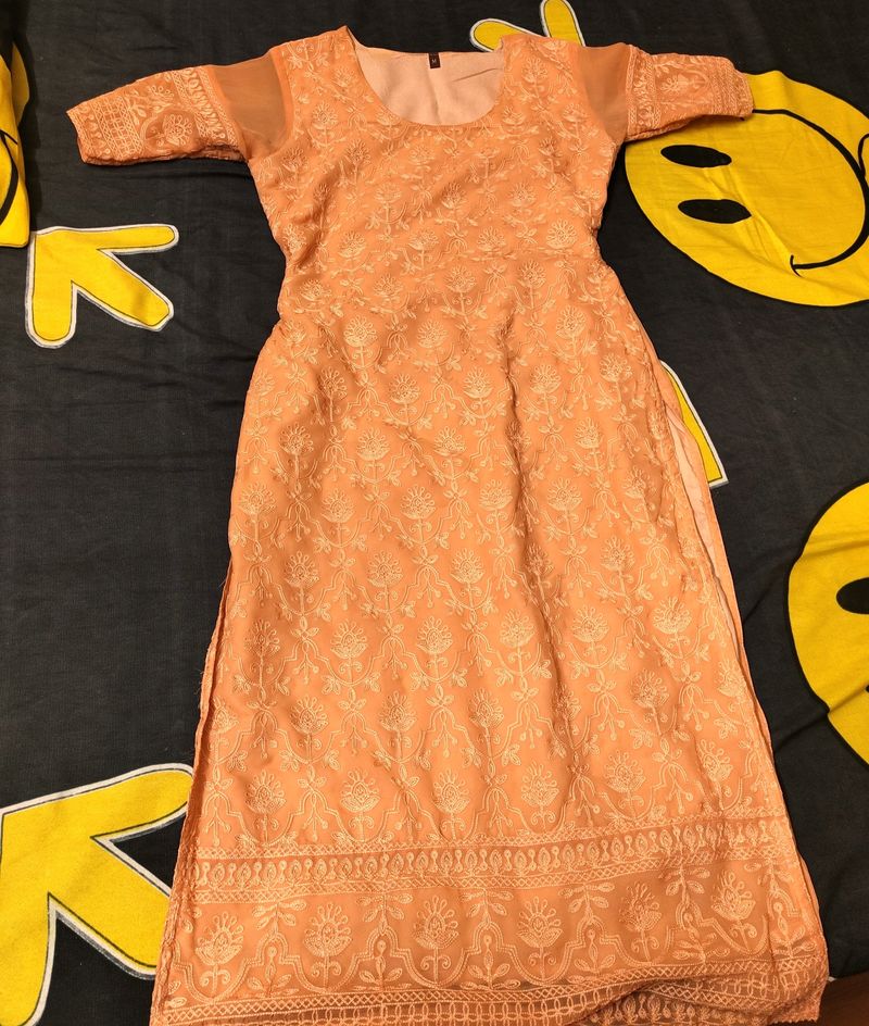 Beautiful Peach Kurti With Self Embroidery