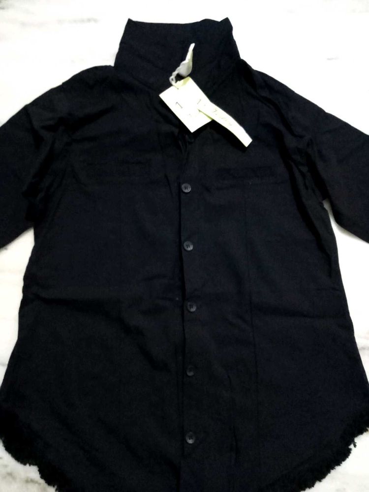 A Black Shirt With Good Or Excellent Quality.