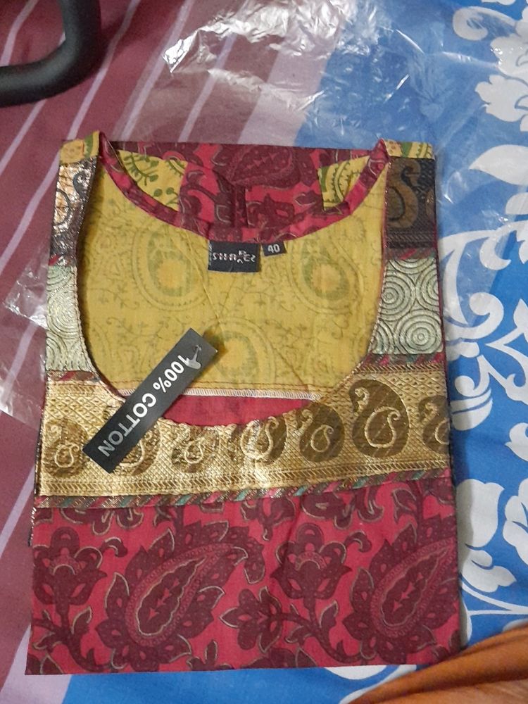 New kurti ....maroon colour printed pure cotton...cap sleeves...Round neck...no flaws...own factory made