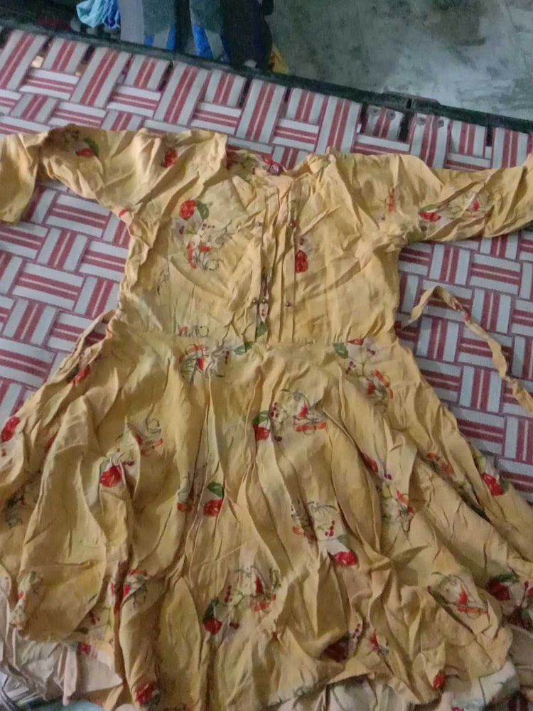 Yellow Cotton Frock With Print Design