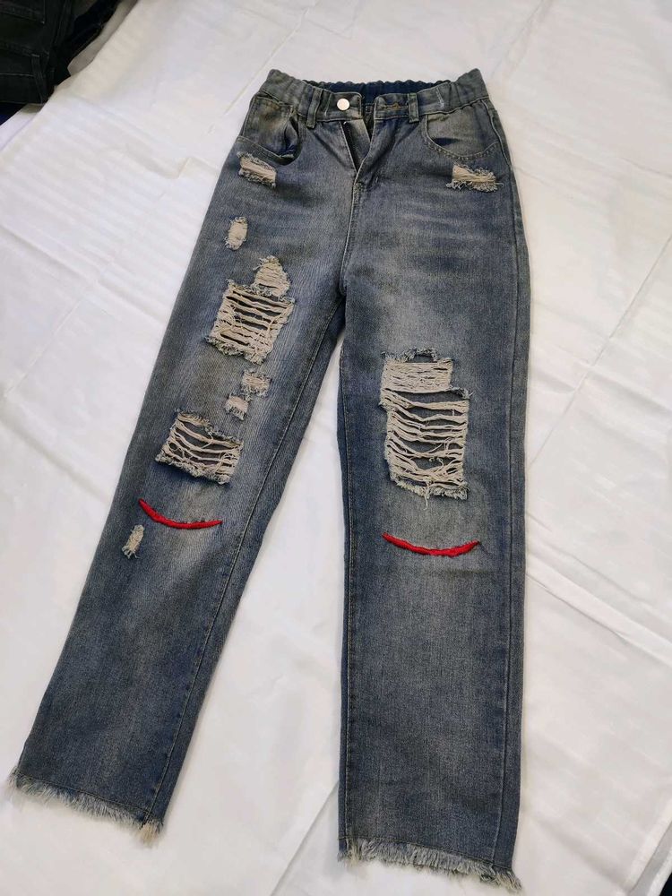 Women High-Rise Heavily Washed Distressed Jean