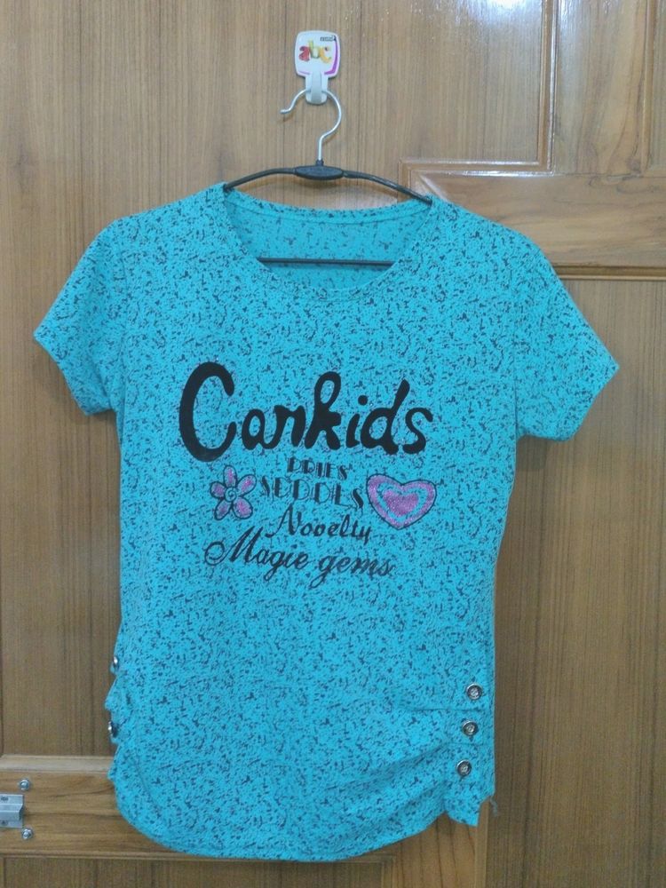 Blue Cotton T Shirt With Black Print.