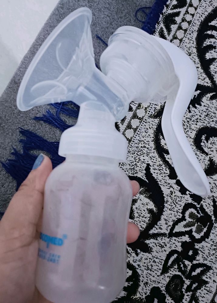 Breast Milk Pump, Nipple Shield And Bottle