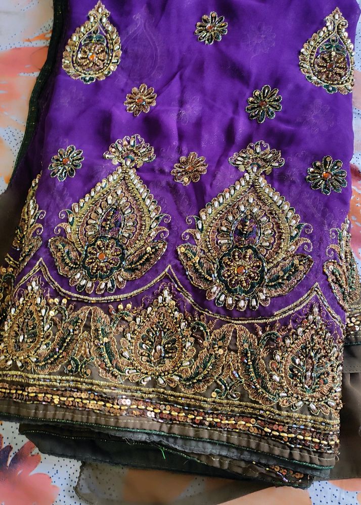 Heavy Purple Saree With Antique Golden Embroidery