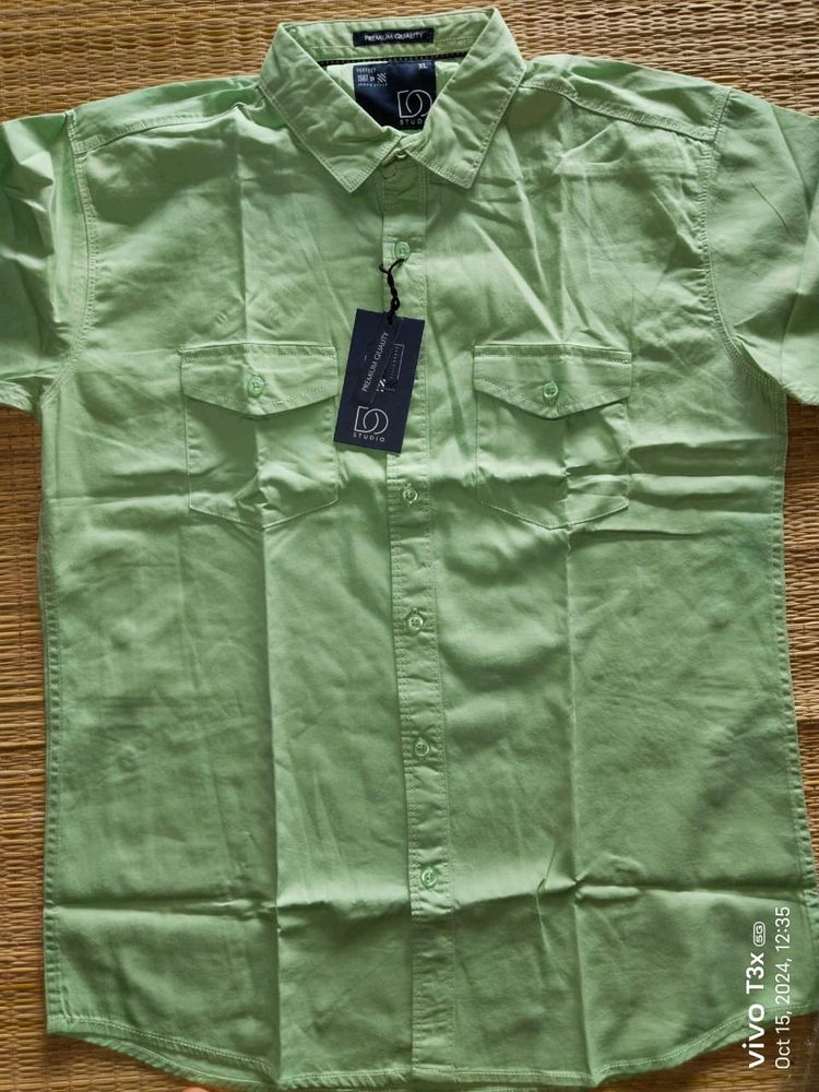 Premium cotton half shirt featuring two pockets.