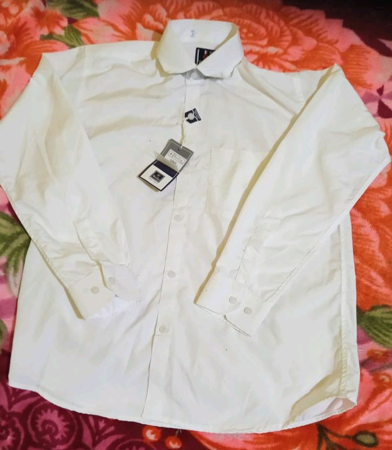 It Is A New With Tag White Men Shirt 👕