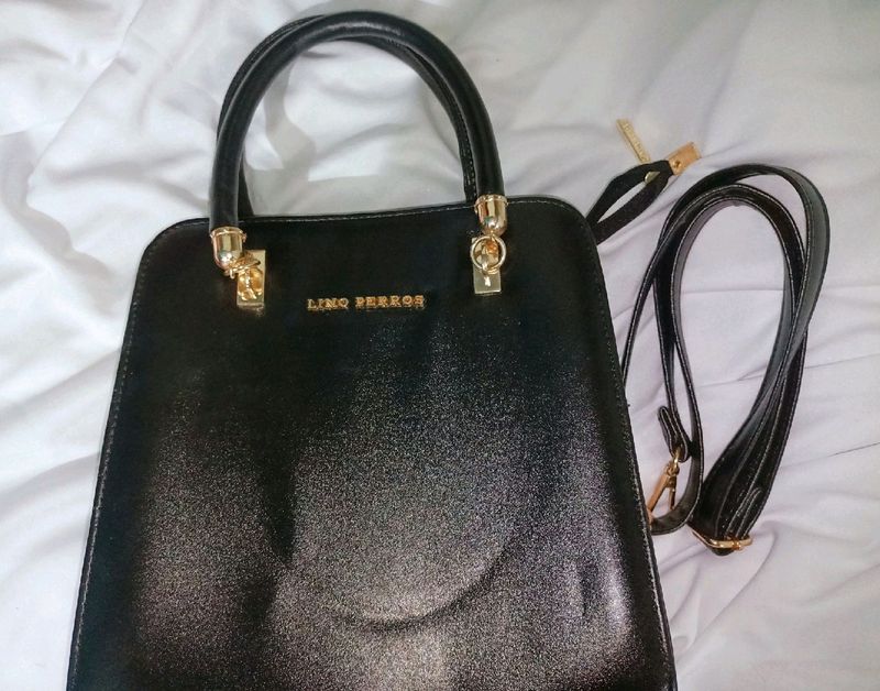 The black satchel handbag- Lino Perros