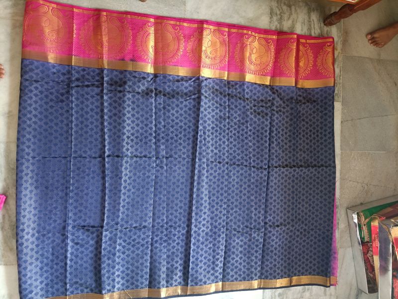 A Pattu Navy Blue nd Pink Coloured Saree.