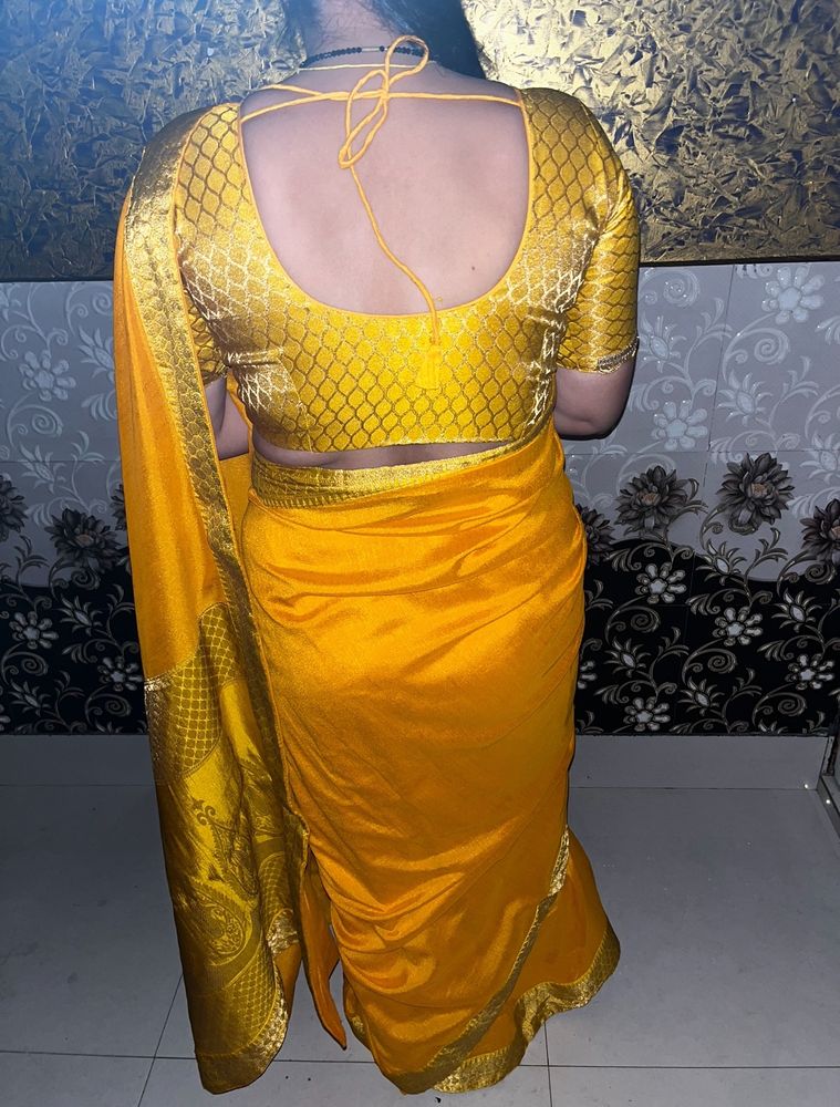 Yellow saree with blouse 1 time used only new sare