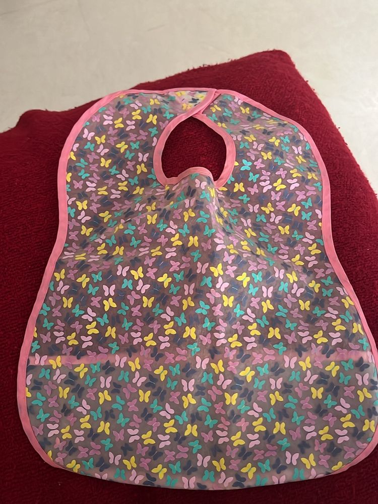 Preloved Mothercare Waterproof bib -flowers