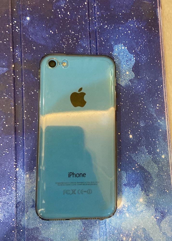 I Phone 5c With Cover and Earphones