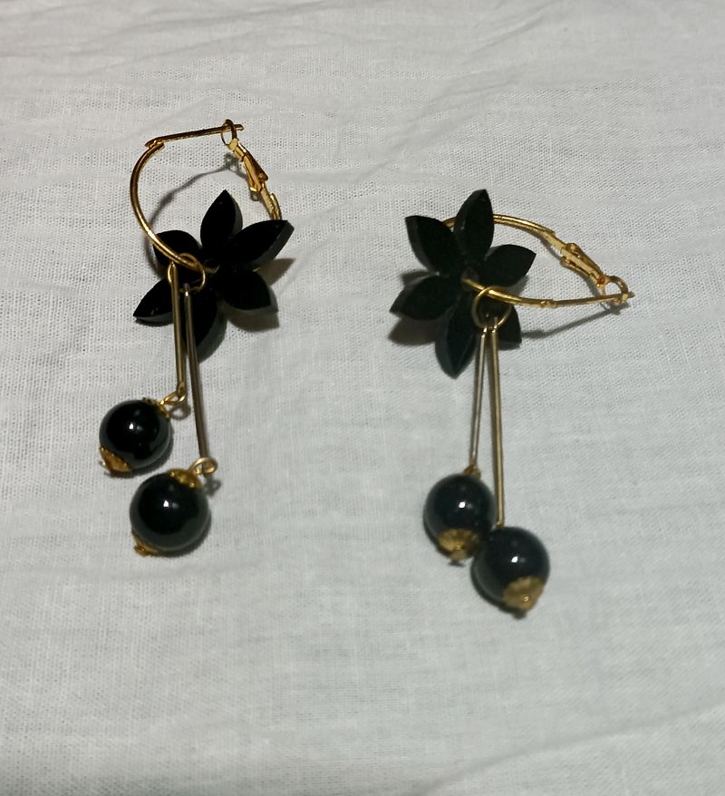 Earing Of Wood Black In Colour