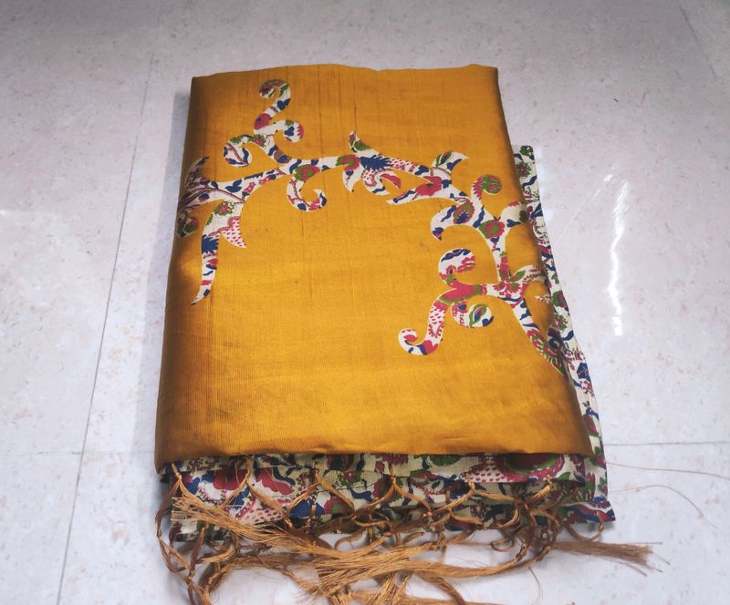 Beautiful Golden coloured floral silk Saree with lace