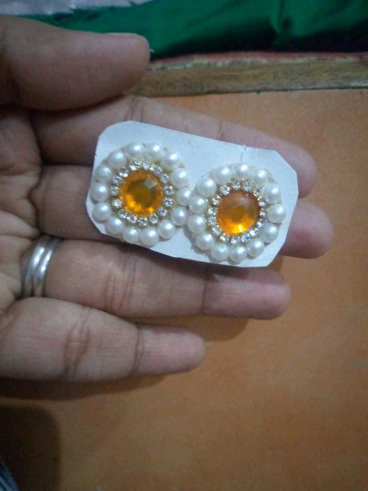 Kundan Studs In Orange Colour