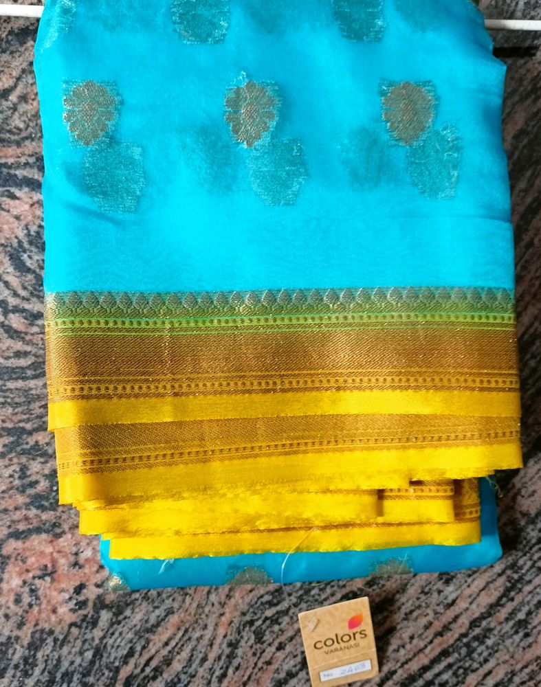 Colours Silver Pattu Saree.