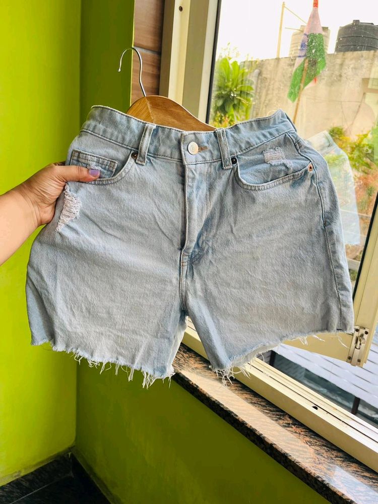 H&M light blue washed ripped shorts