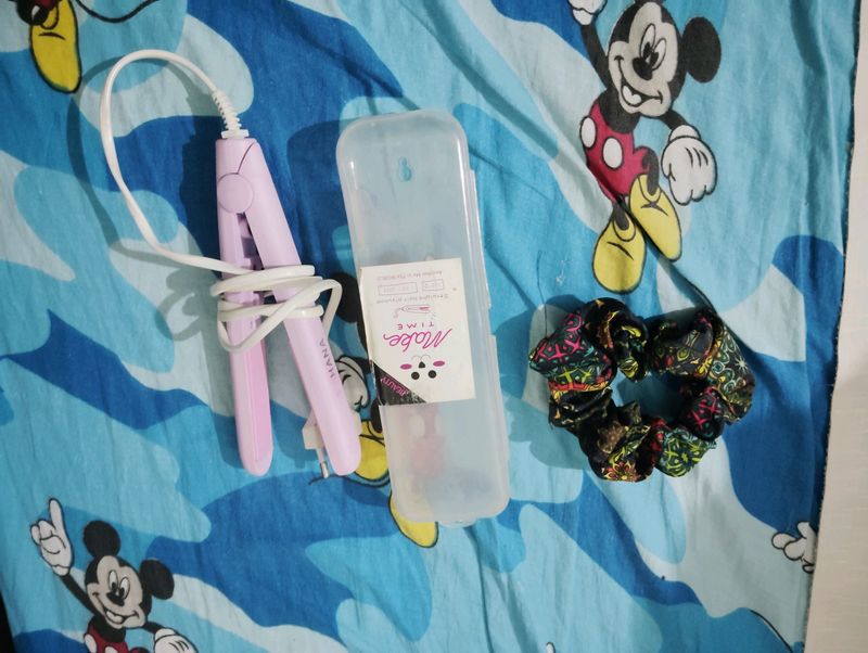 Unused Hair Scrunchie And A Mini Hairstraightner