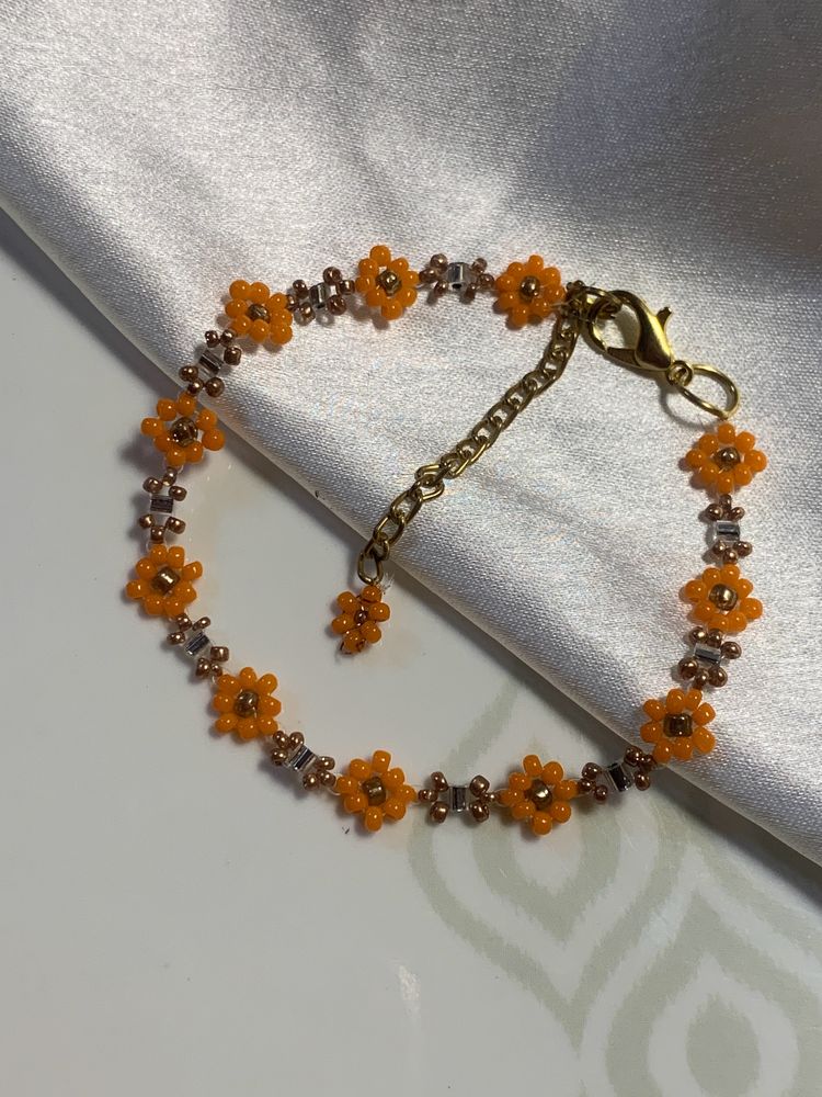 crystals and orange colour bracelet