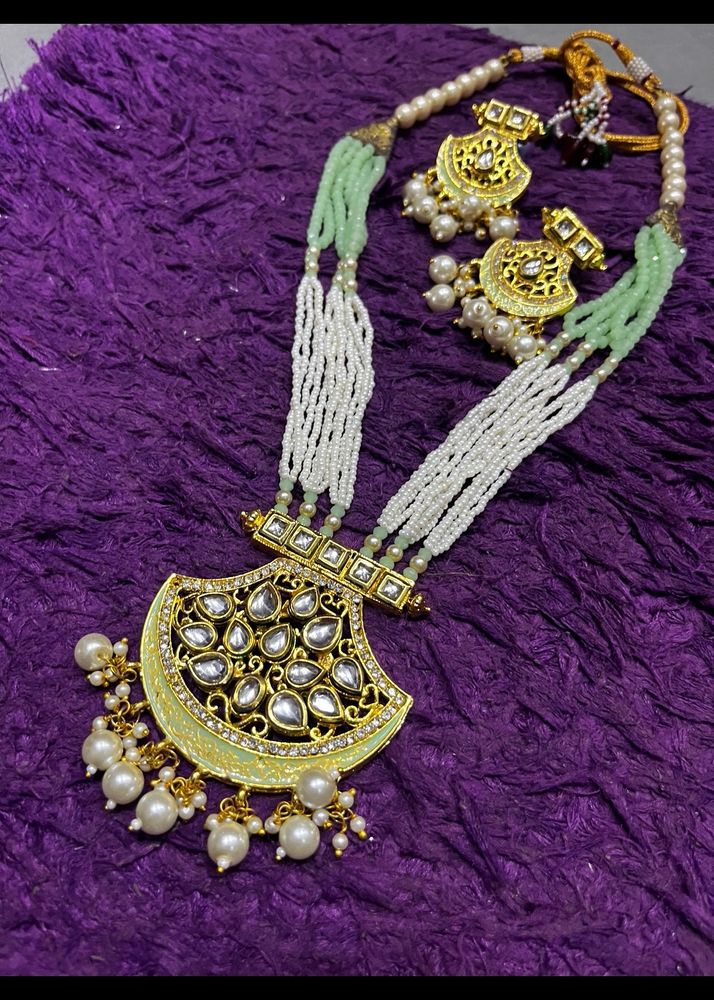 Enduring Charm: Long Pearl Necklace & Earrings Set