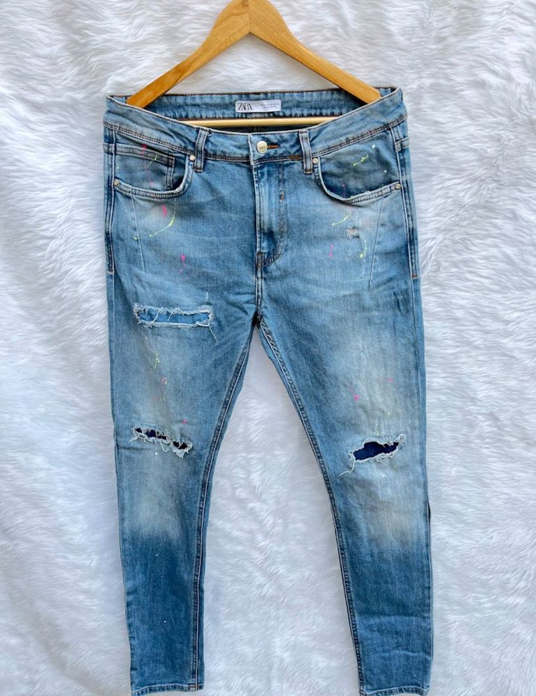 Zara ripped patches colour splash jeans