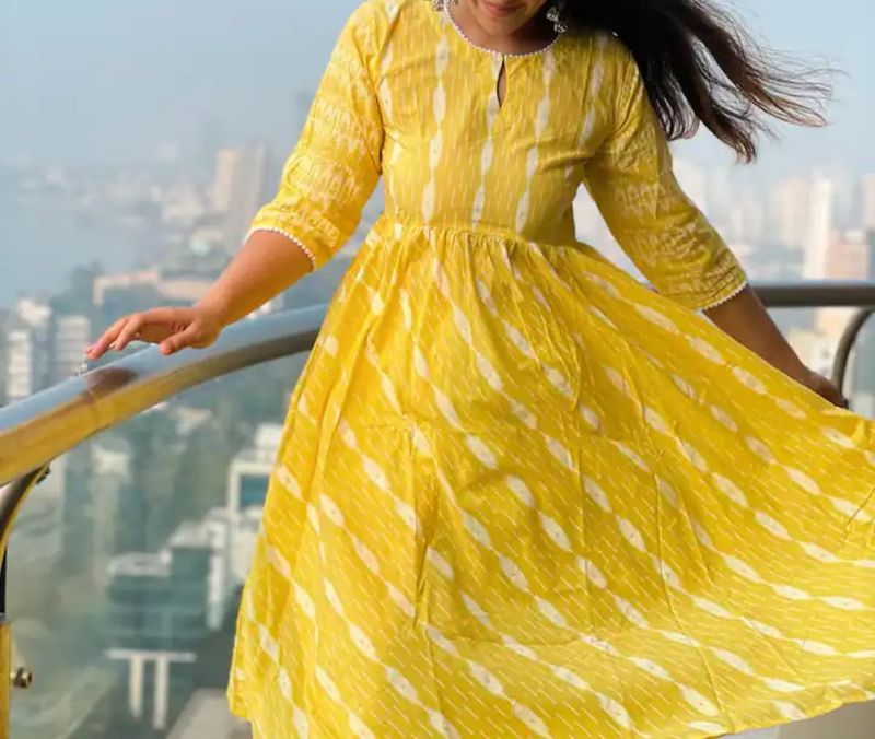 Women Yellow And White Ikat Print Kurta With Palazzos