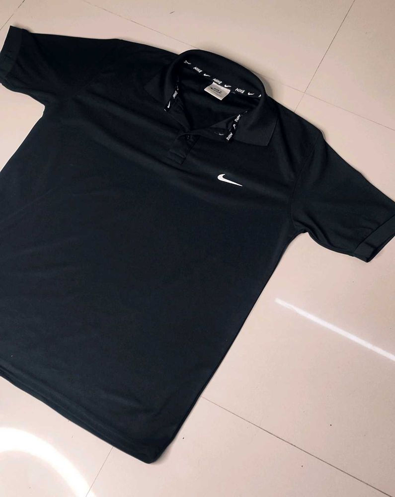 NIKE POLO TEE.