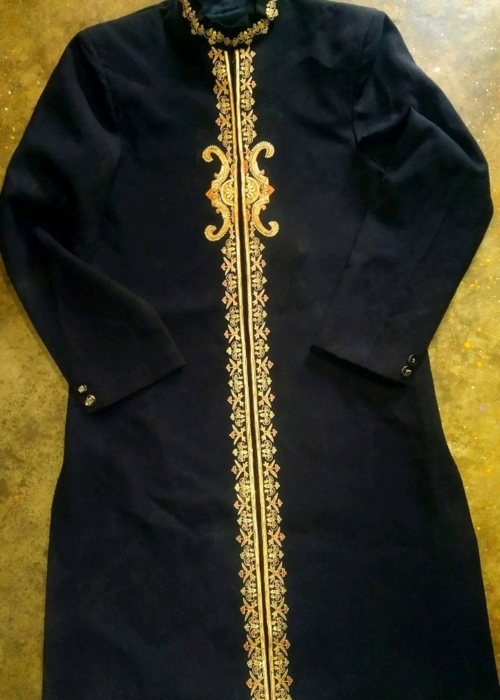 Sherwani with hard shoulder and embroidery.