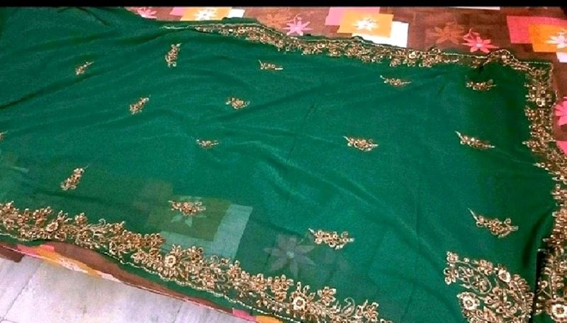 green heavy stone work saree