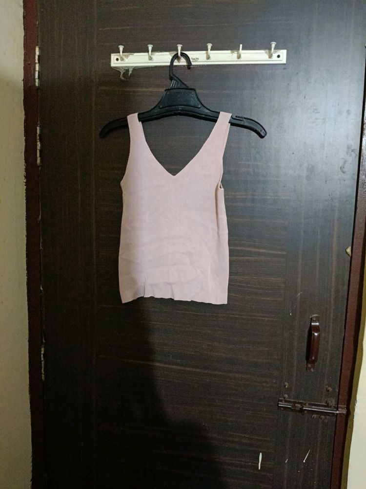 Body Hugging Top With Back Design