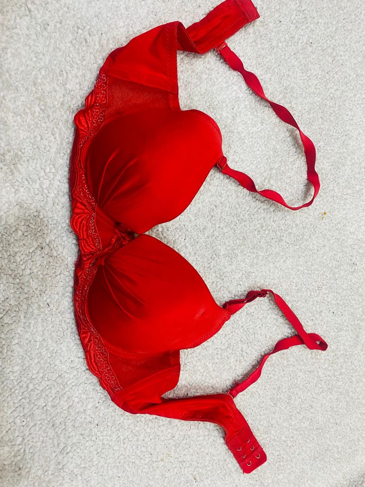 Red Color Puffe Bra Under Plastic Frem