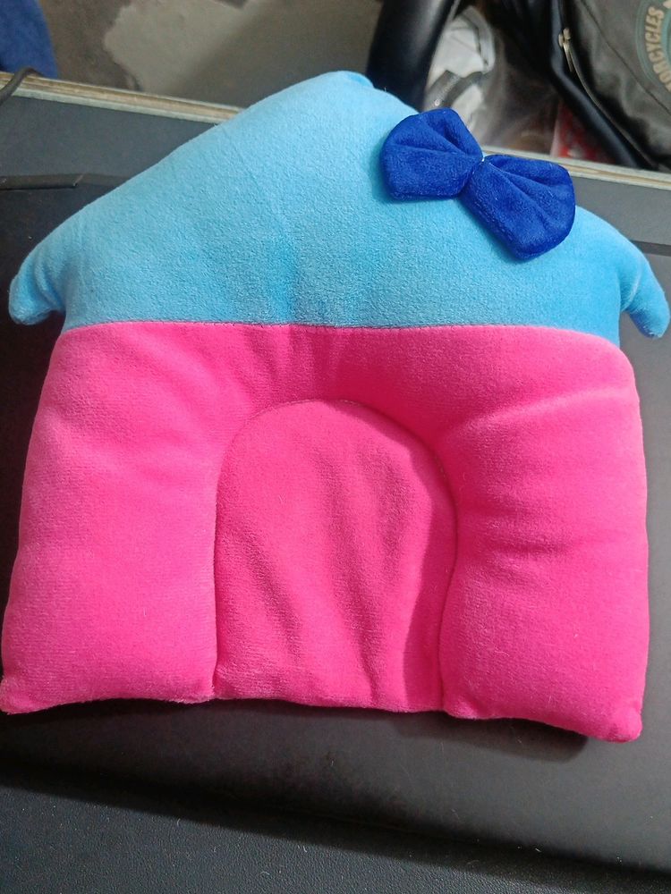 BABY RAIW PILLOW IN SOFT PINK AND BLUE HUES