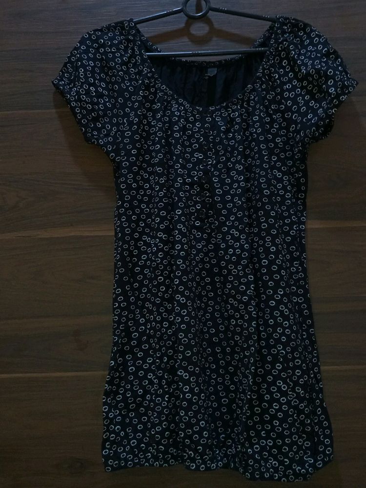 Black top with white circle print