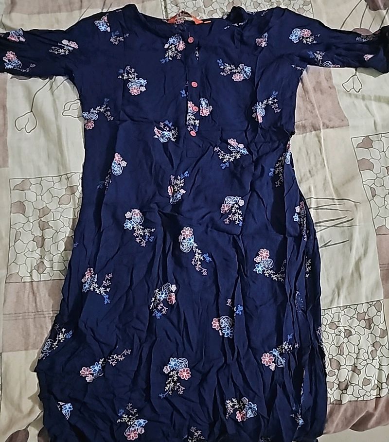 Its Navy Blue Top With Some Multi Colour Flowers