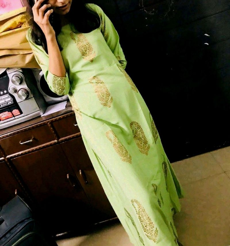 Green Dress With Bangles And Earrings