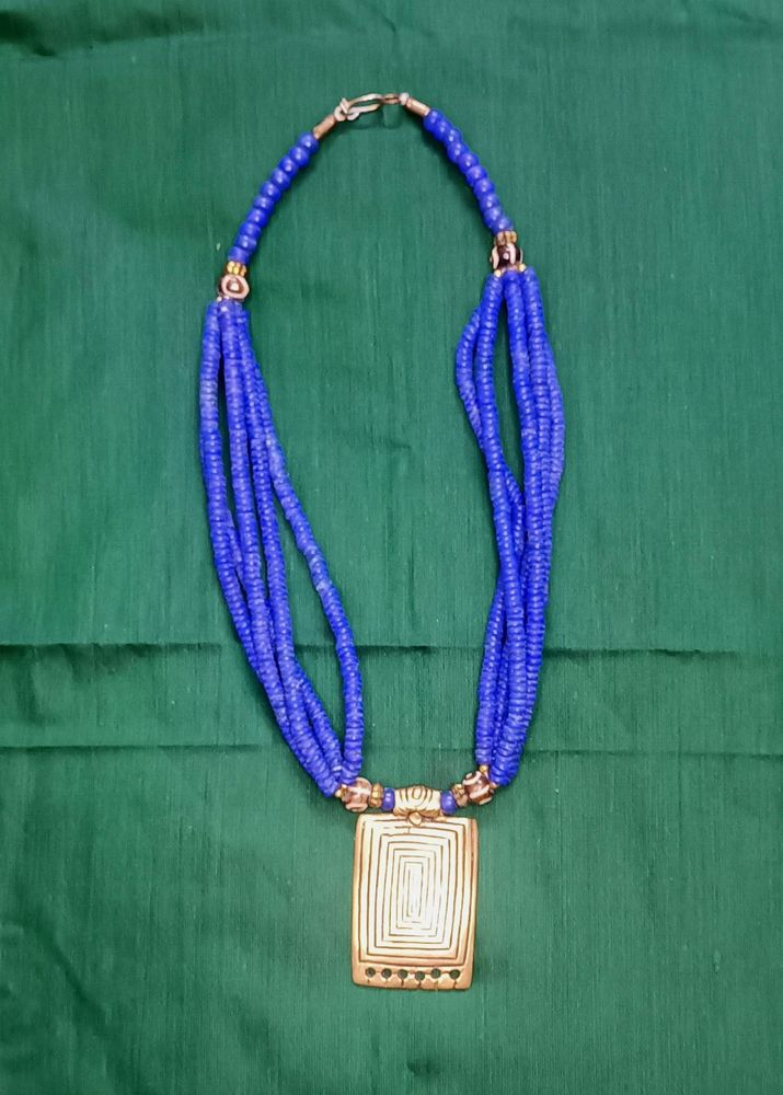 Royal Blue Necklace With Gold Brass Pendant.